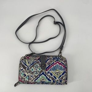 Sakroots crossbody wallet phone case. Multicolor adjustable strap.
